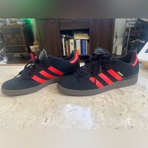 Adidas Busenitz Black Sneakers with Vibrant Red/orange Stripes